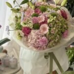 A bouquet of hydrangeas, lilies and gerberas