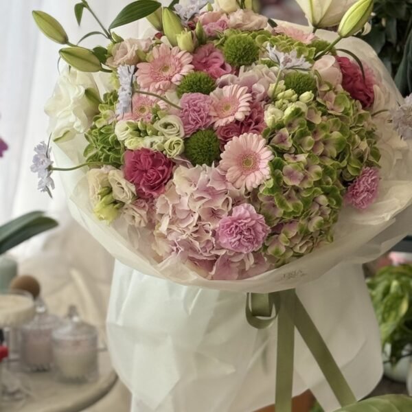A bouquet of hydrangeas, lilies and gerberas