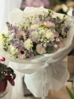 A bouquet of hydrangeas, spider gerberas and eustomas