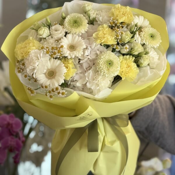 A bouquet of white hydrangeas, gerberas and chrysanthemums